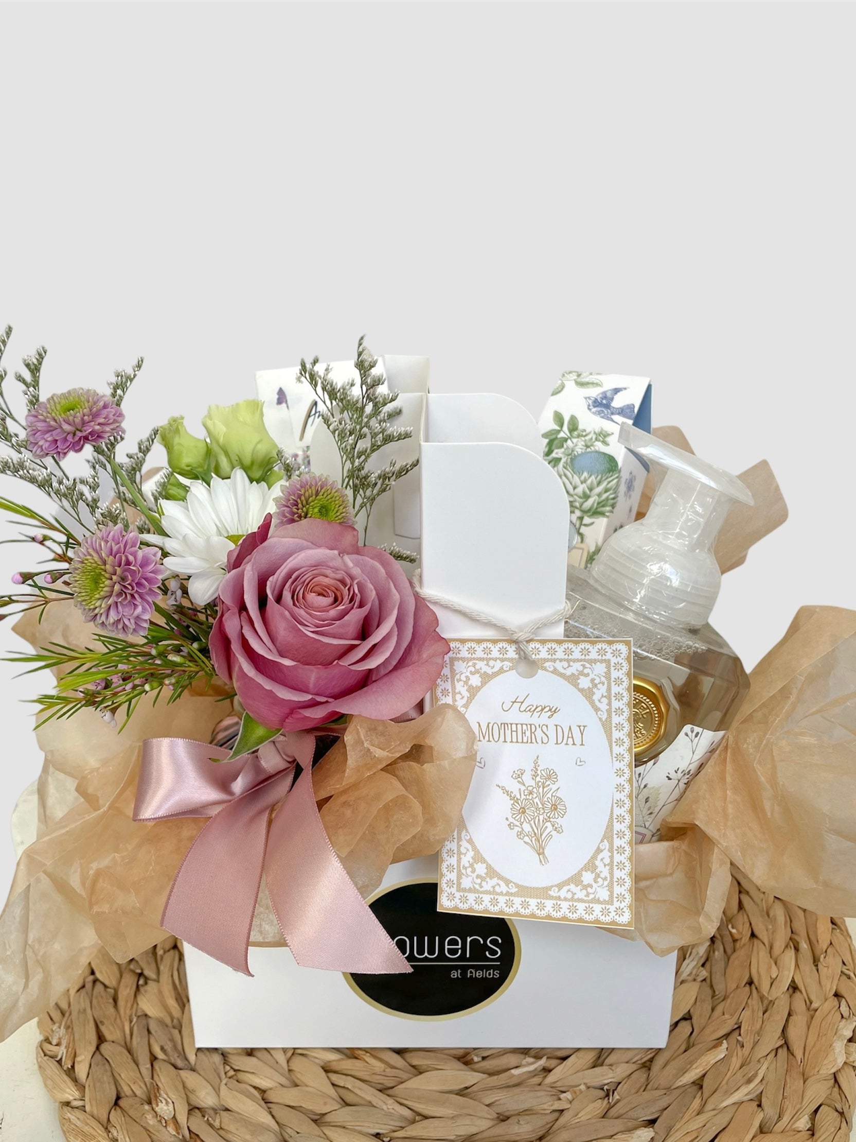 The Custom Bloom Carrier, a 4-sided gift box arrangement from Flowers at Fields